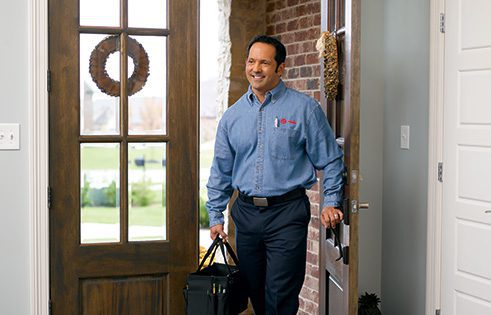 A technician completing a furnace replacement for a home in Lynnwood, WA